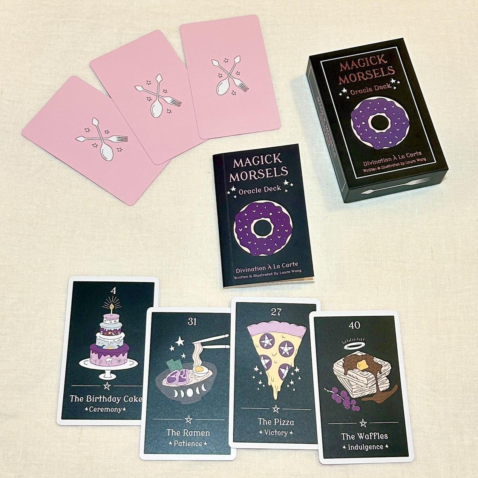 Magick Morsels Oracle Deck. This 42-card deck and guidebook is an exploration of the things we crave. Magick Morsels is inspired by our favorite culinary delights and infused with a spoonful of witchcraft. Use this deck to guide you on your path, or when you can't decide what to make for dinner.