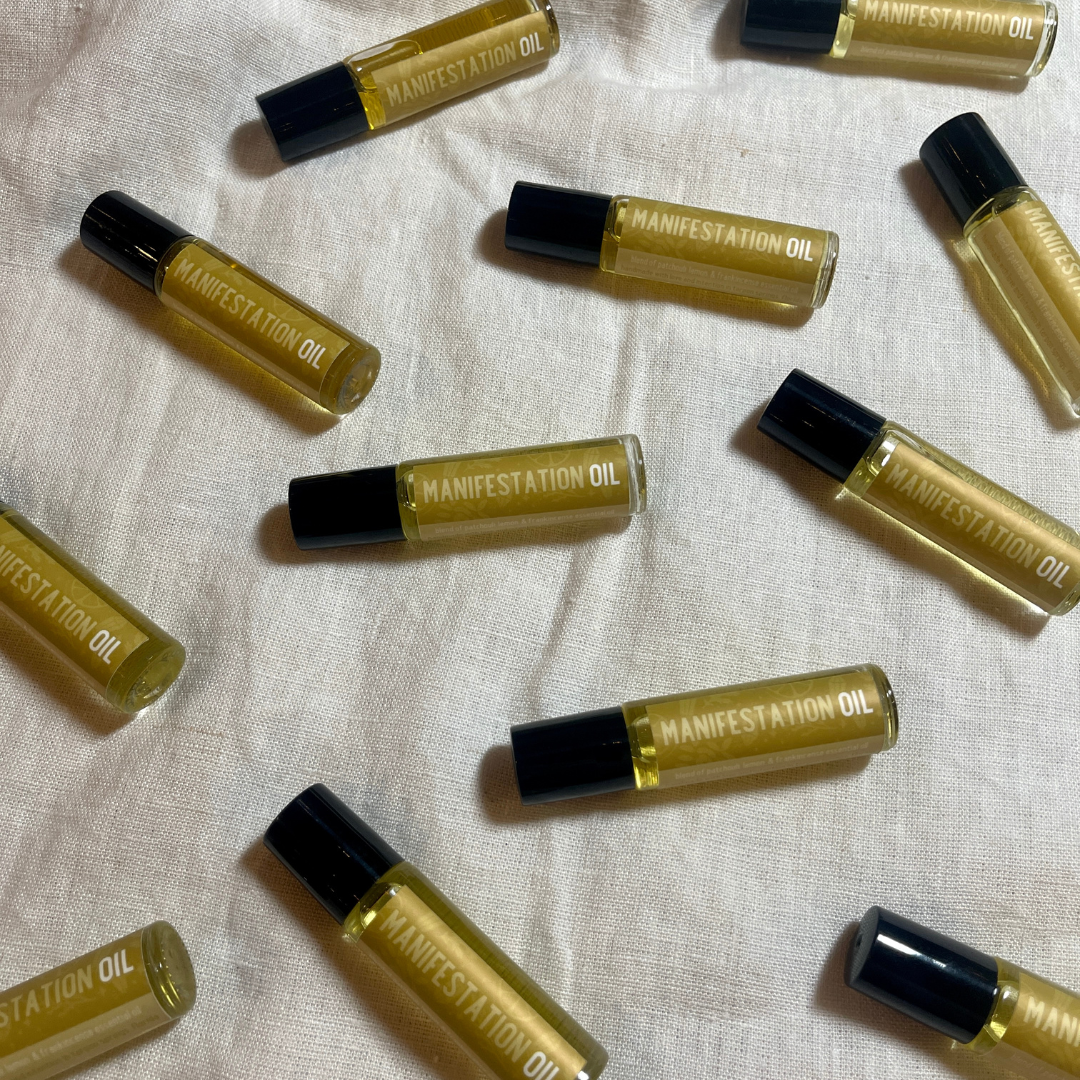 Manifestation Oil Roll On. Build a manifestation practice with this oil roll on! a grapeseed oil base with a blend of patchouli, lemon, & frankincense essential oils.