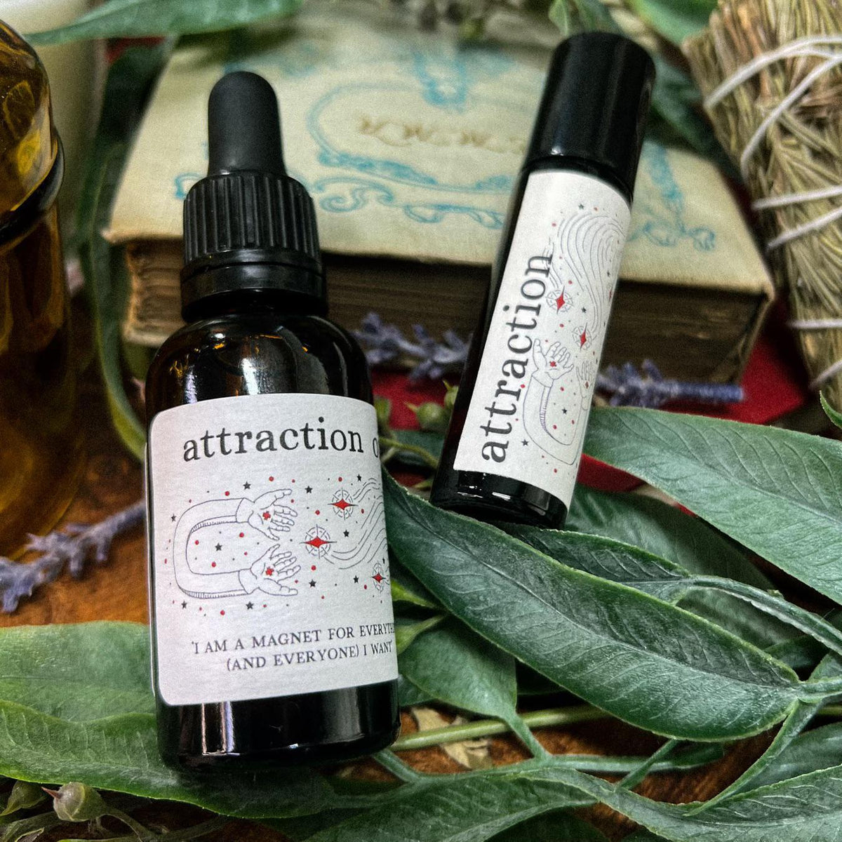 Attract your manifestations with our hand crafted Attraction Oil. 

Bring Attraction on the go with a 10ml Roll On, or use the 1oz Dropper Bottle in baths, spell jars, or as a dressing for candles!

orange, ylang ylang, and bergamot essential oils with a grapeseed oil base. 1oz Dropper Bottle is infused with sunstone.
