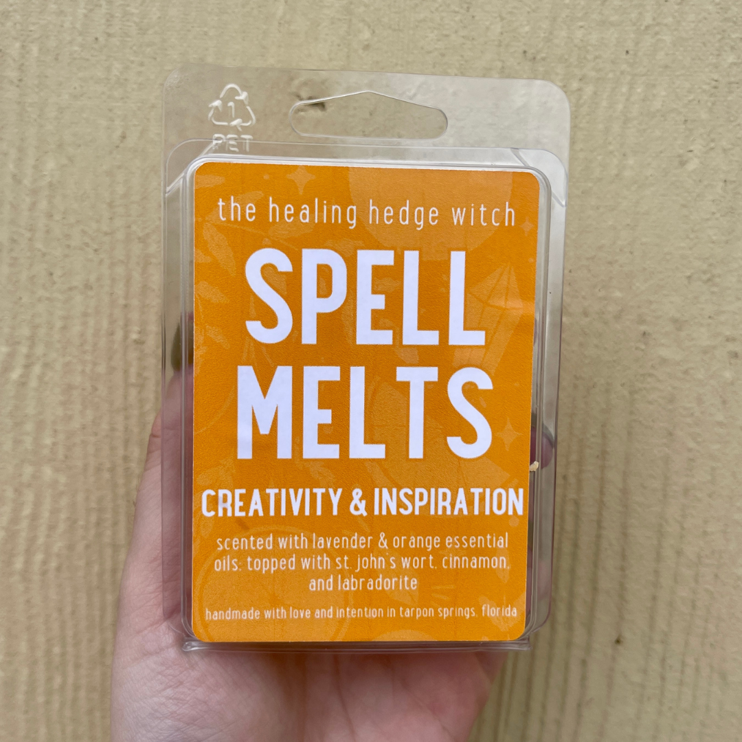 Bring creativity forward in your life with these hand-poured, small-batch wax melts. Scented with lavender &amp; orange essential oils &amp; topped with St. John&#39;s wort, cinnamon, and labradorite