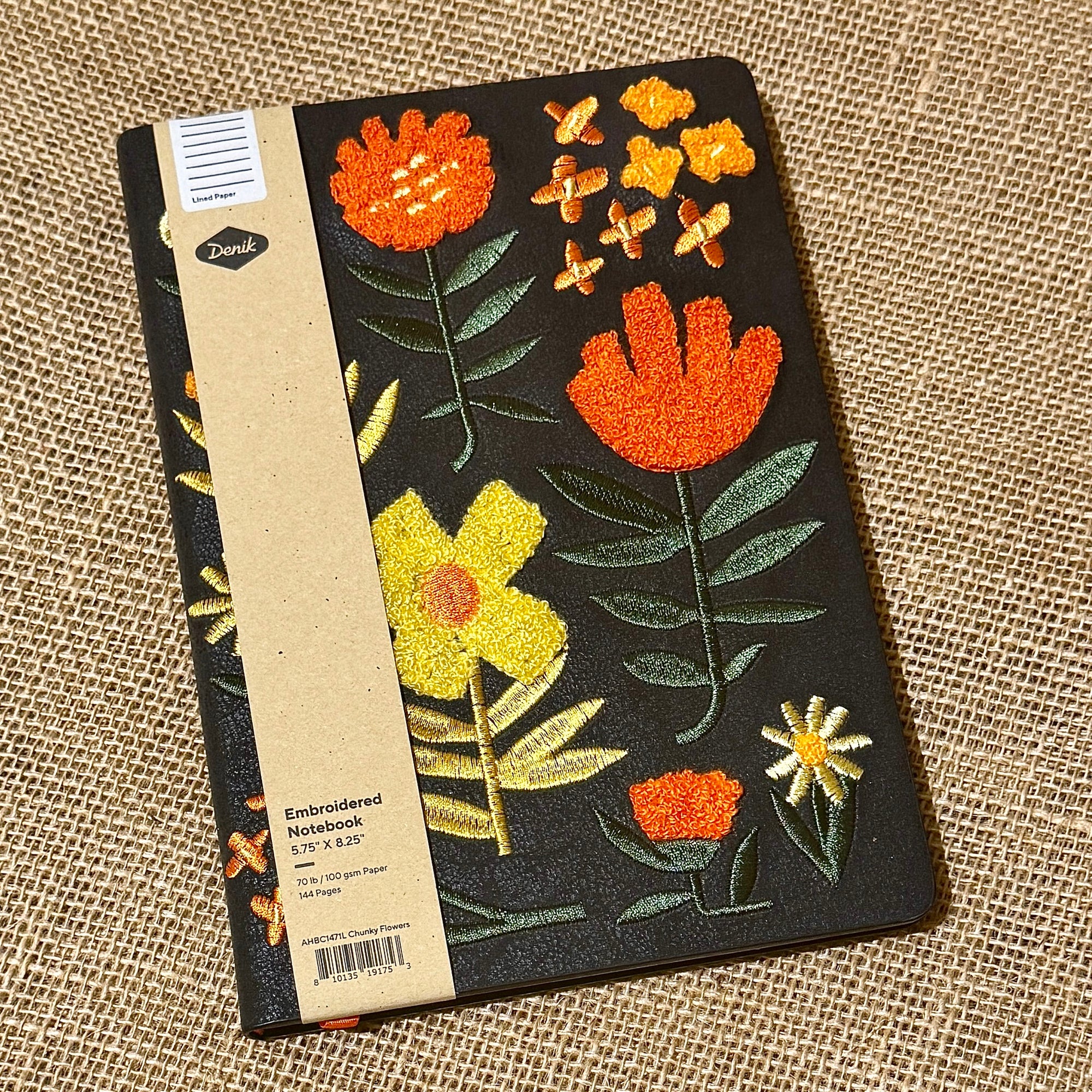 Chunky Flowers Embroidered Journal Notebook yellow and orange flowers with green and yellow stems on charcoal colored faux leather