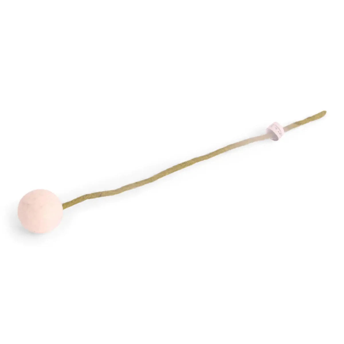A plush toy called Big Flower Ball by The Healing Hedge Witch, featuring a round, light pink head and long tan tail with a small tag. Inspired by Danish designs, handmade from wool, set against a white background.