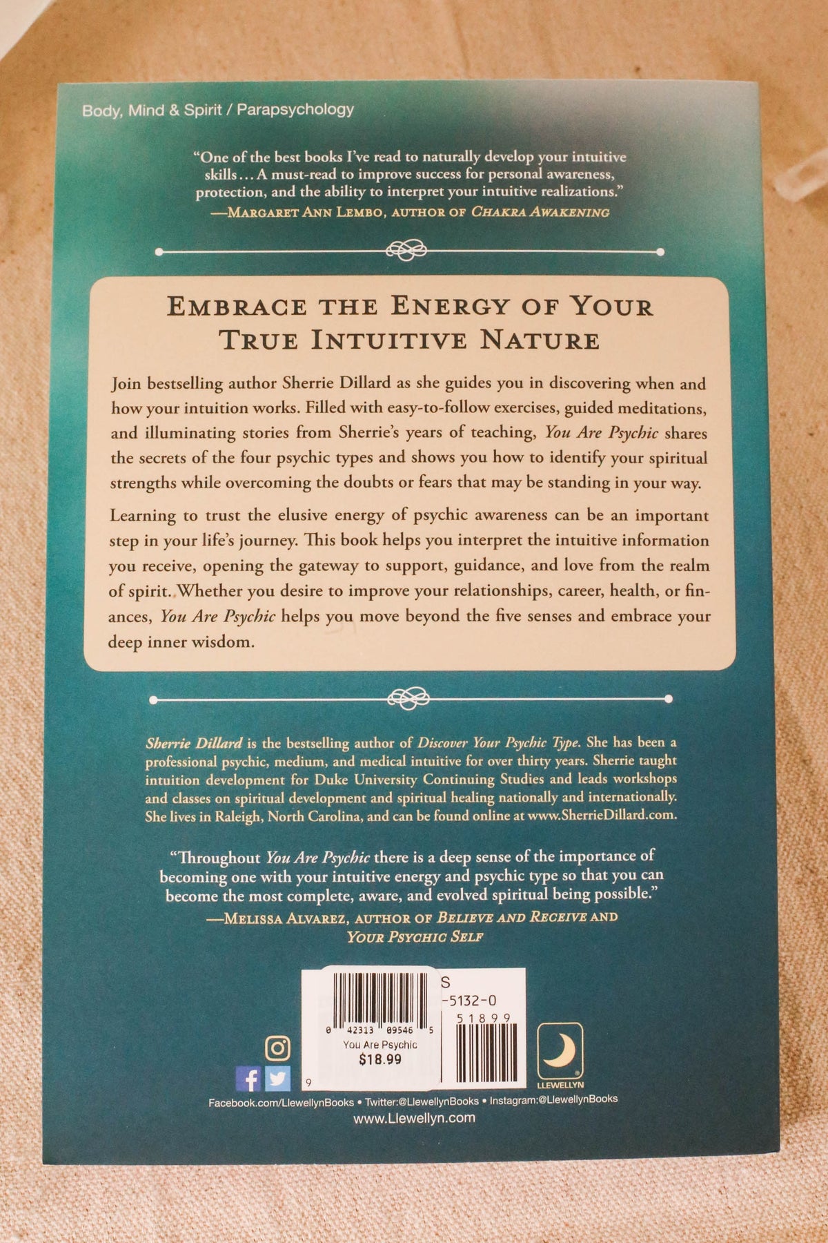 The back cover of "You Are Psychic" by The Healing Hedge Witch describes its themes on intuition, features endorsements, a summary, the author's bio, and includes a barcode with a $16.99 price.