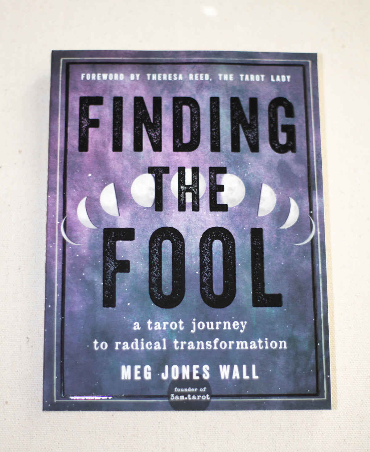 The image displays the cover of "Finding the Fool" by The Healing Hedge Witch, featuring a starry night background with moon phases and bold white text on a purple gradient.