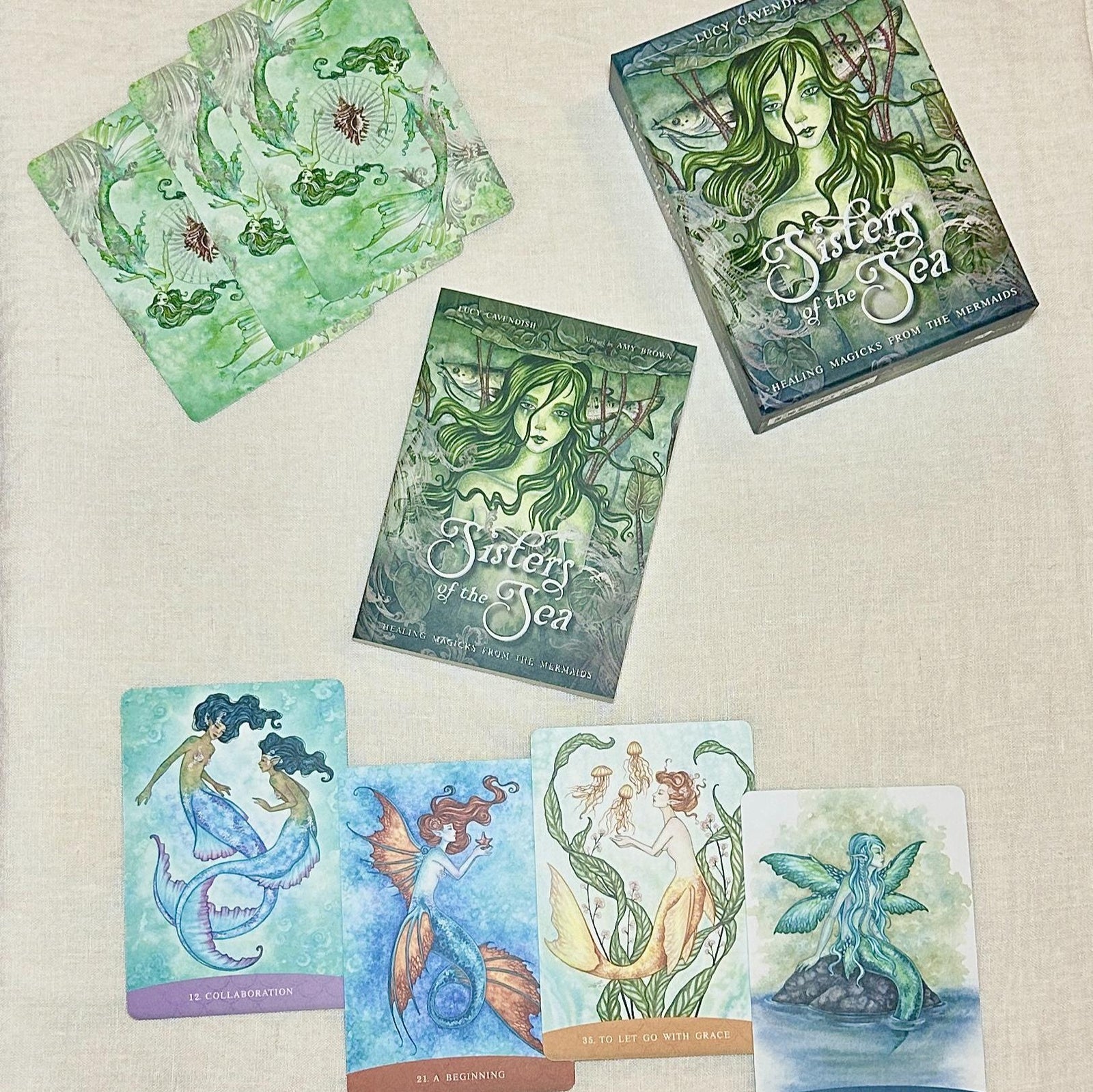 Sisters of the Sea Oracle Deck. Explore the symbology, mystery, and deities of the sea and enhance your readings with mermaid tools, insights, prophecies, and offerings. Bring your questions to the Sisters of the Sea and be guided by their divine visions of past, present, and future.