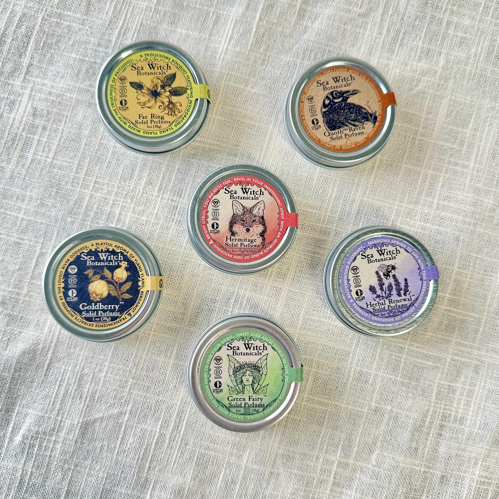 Solid Perfume candelilla wax, coconut oil, grapeseed oil, cocoa butter, shea butter, essential oil blend 1 oz