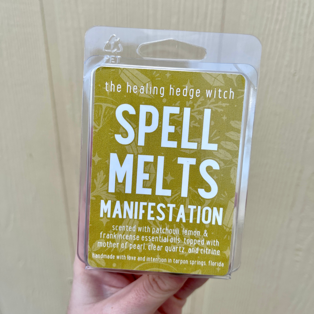 manifestation spell wax melt scented with patchouli, lemon, &amp; frankincense essential oils; topped with mother of pearl, clear quartz, and citrine.