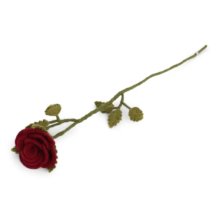 The Healing Hedge Witch Long Felt Stem features a single red rose with green leaves and a long stem, crafted from textured felt in Danish-inspired design, displayed on a white background.