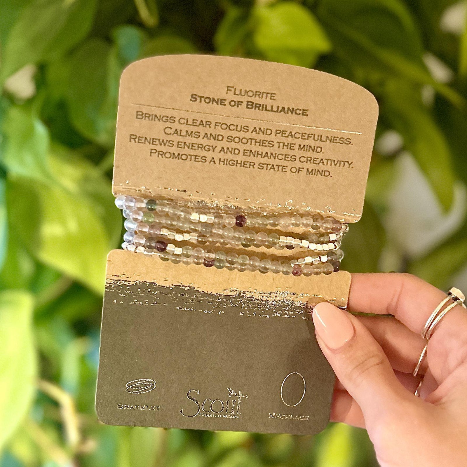 Fluorite Stone Wrap Bracelet. Tap into the energies of the earth.  Semi precious gemstones adorn wrist & neckline. Effortlessly converts from bracelet to necklace.  Can be wrapped 4-5 times as a bracelet and 1-2 times as a necklace. 