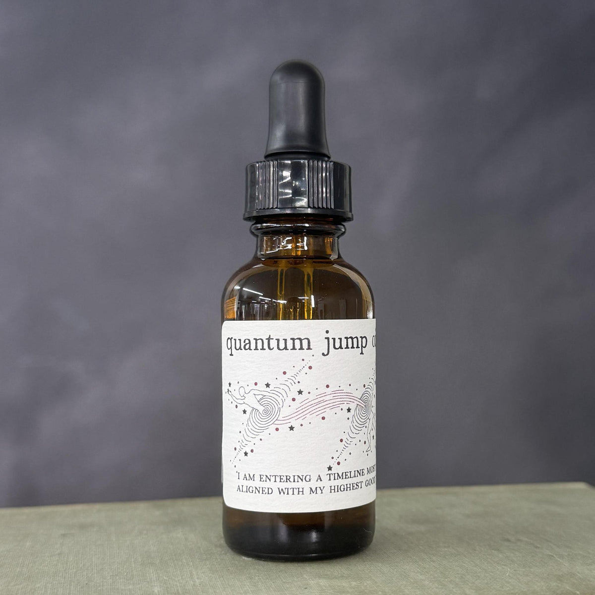 hand crafted Quantum Jump Oil, Quantum Jump on the go 10ml Roll On 1oz Dropper Bottle use in baths, spell jars, or as a dressing for candles! Lavender and lime essential oils grapeseed oil base.Dropper Bottle is infused with clear quartz.