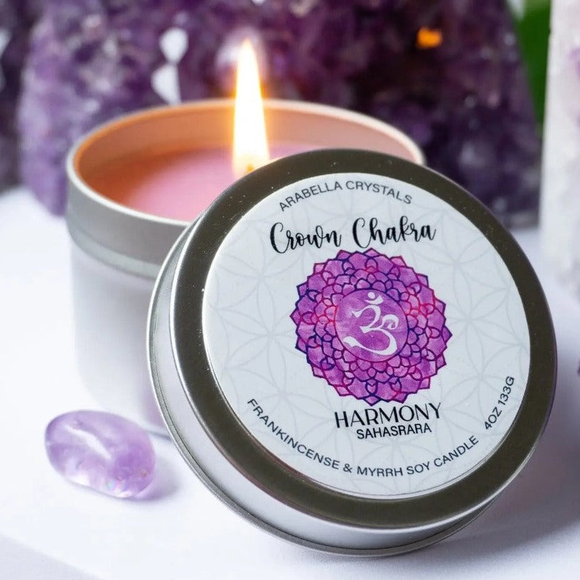 Crown Chakra Candle Tin Frankincense and Myrrh + Coriander Seed, Cumin, Lemon, Orange, Patchouli, and Olibanum essential oils. With hidden tumbled crystal amethyst