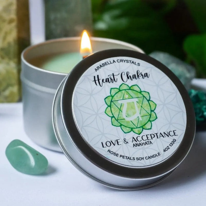 Heart Chakra Candle Tin Heart Chakra Candle Tin ozone and green leaves, before revealing a heart of rose, carnation, lily of the valley, and ylang ylang. Powder and a hint of peppercorn in the base bolster the simple beauty of this classic scent.&nbsp; Rose Petal + patchouli essential oil. with hidden crystal tumble green aventurine 