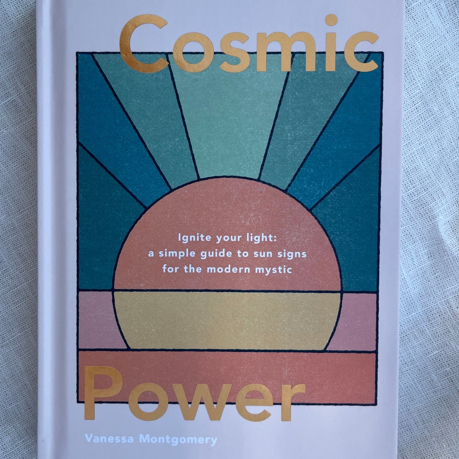 Cosmic Power book ignite your light: a simple guide to sun signs for the modern mystic by vanessa montgomery