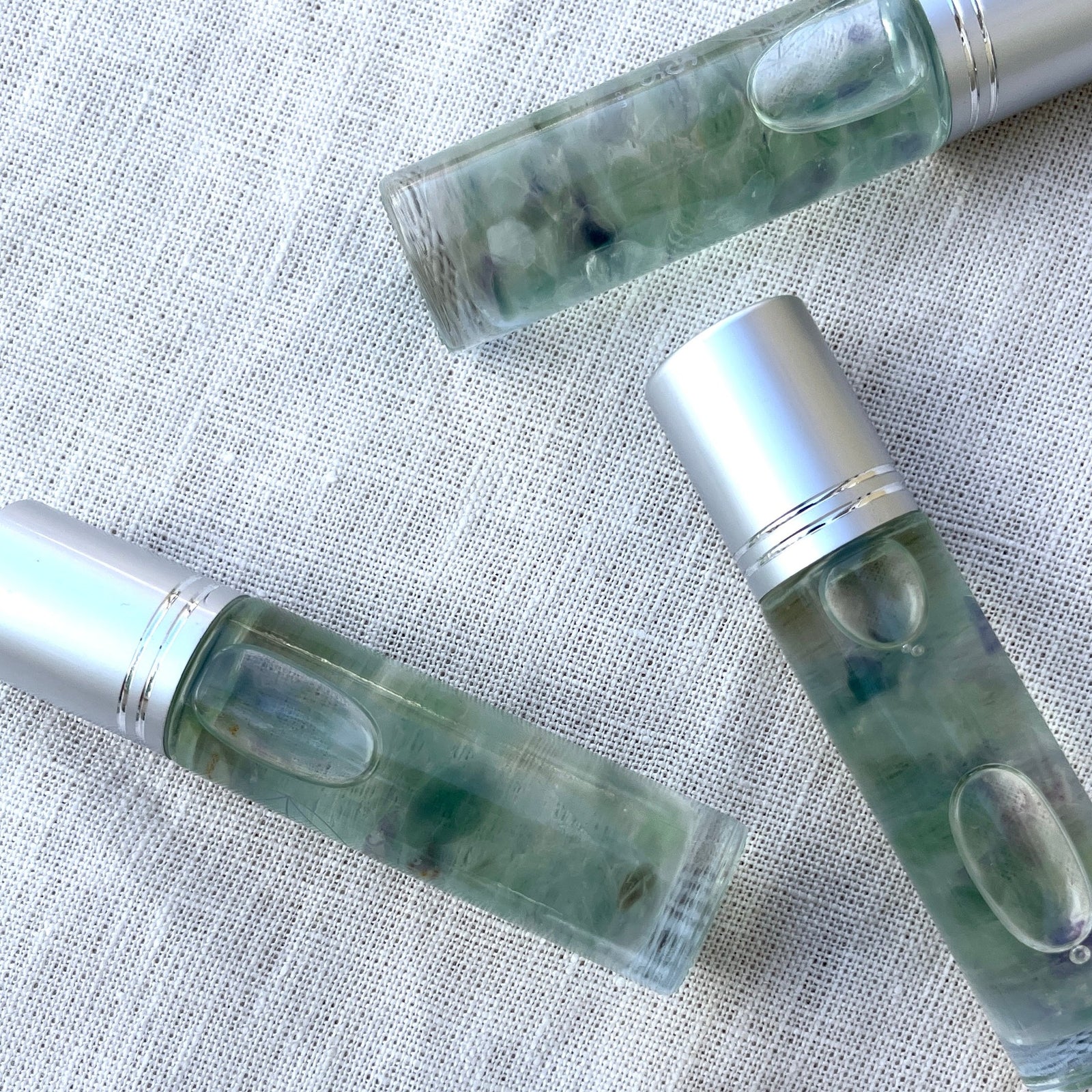 Intuition Crystal Charged Essential Oil Roller A blend of patchouli and lavender essential oils with fluorite chips