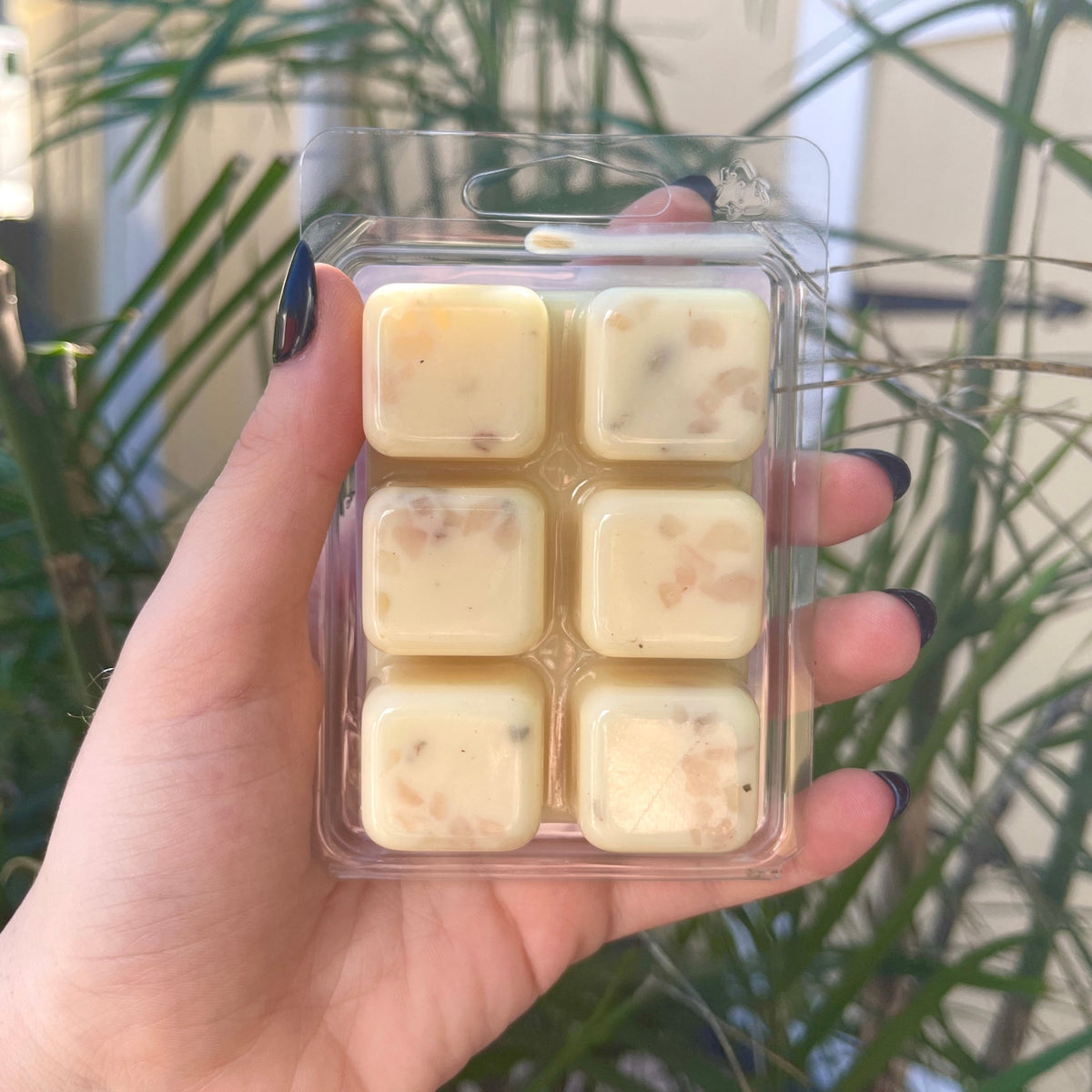 Love Spell wax Melts Bring love forward in your life with these hand-poured, small-batch wax melts. Scented with orange essential oil &amp; topped with apple blossoms, lavender, and rose quartz.