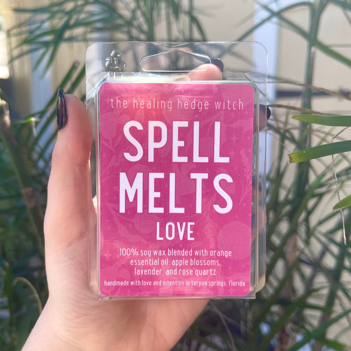 Love Spell wax Melts Bring love forward in your life with these hand-poured, small-batch wax melts. Scented with orange essential oil &amp; topped with apple blossoms, lavender, and rose quartz.