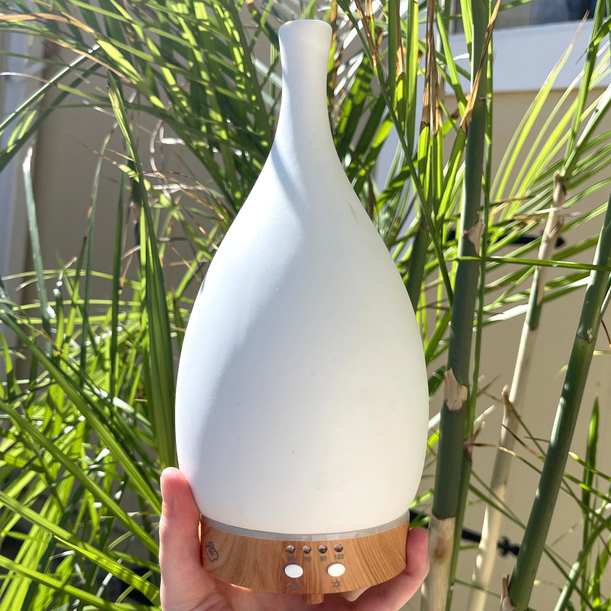 Medium White Ceramic Diffuser Teardrop wood bottom Aromatherapy 4hr continuous / 8hr intermittent run time in addition to the 60, 90- and 120-minute timer modes.