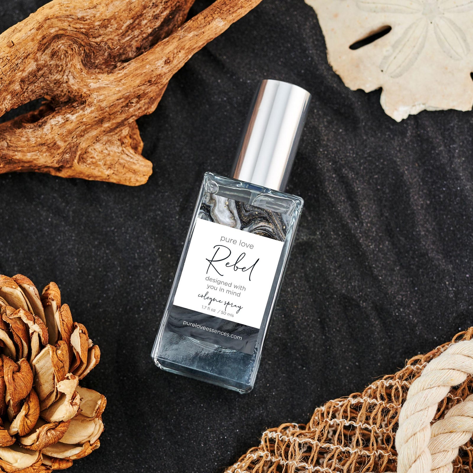 Pure Love Rebel Cologne Spray 1.7oz scents of sensual woods and rugged leather