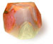 The T. S. Pink Corp SoapRocklet is a multicolored, faceted soap in orange, red, yellow, and white shades, made from natural ingredients and shown on a white background.