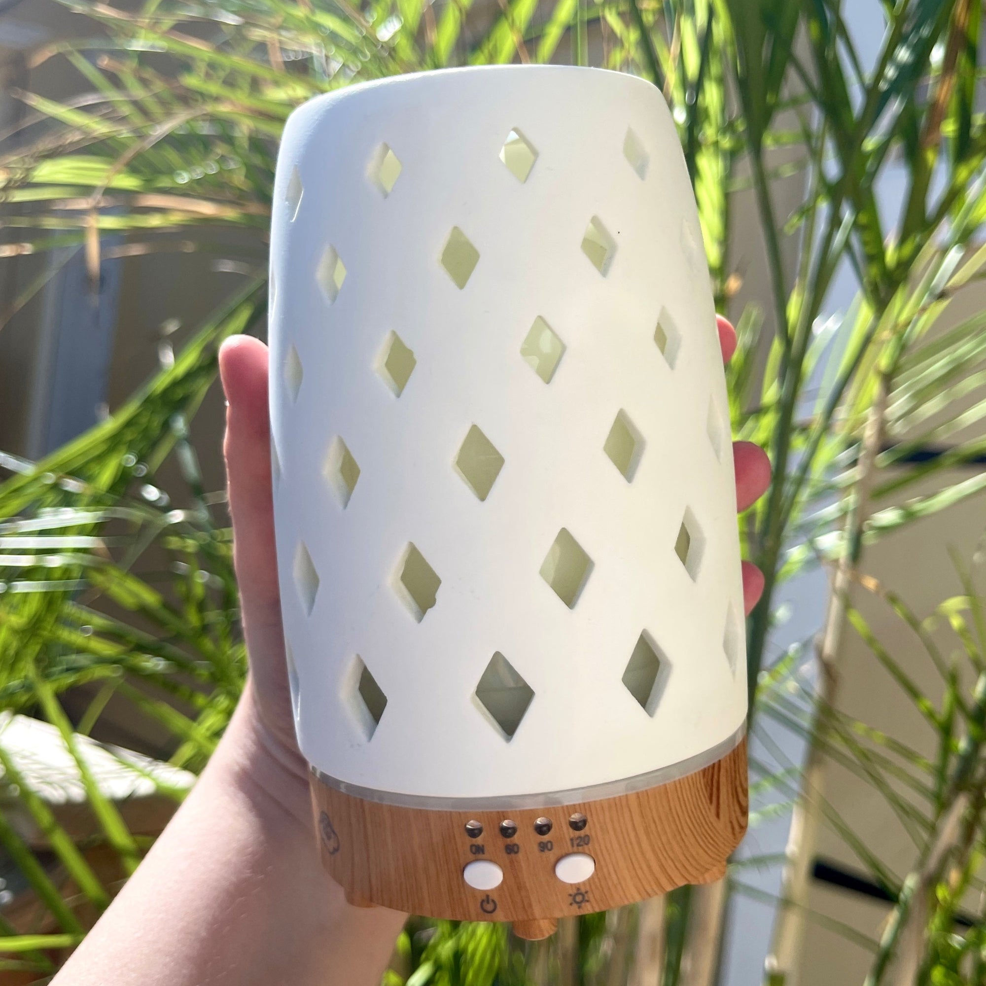 White Ceramic Diffuser with Diamond Cutouts aromatherapy  4-hour continuously or up to 8-hour intermittently and has a timer for 60, 90, or 120 minutes 